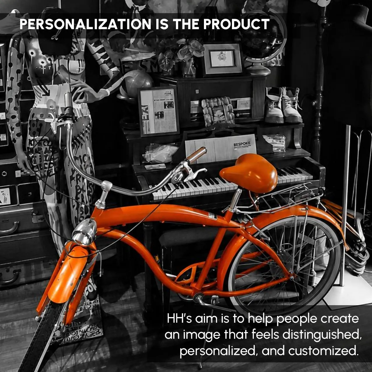 An orange cruiser bicycle parked against a piano inside the store
